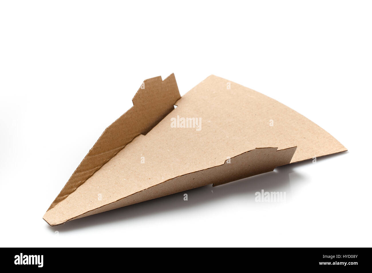Single cardboard packaging for pizza slice in triangular shape isolated on white. Stock Photo