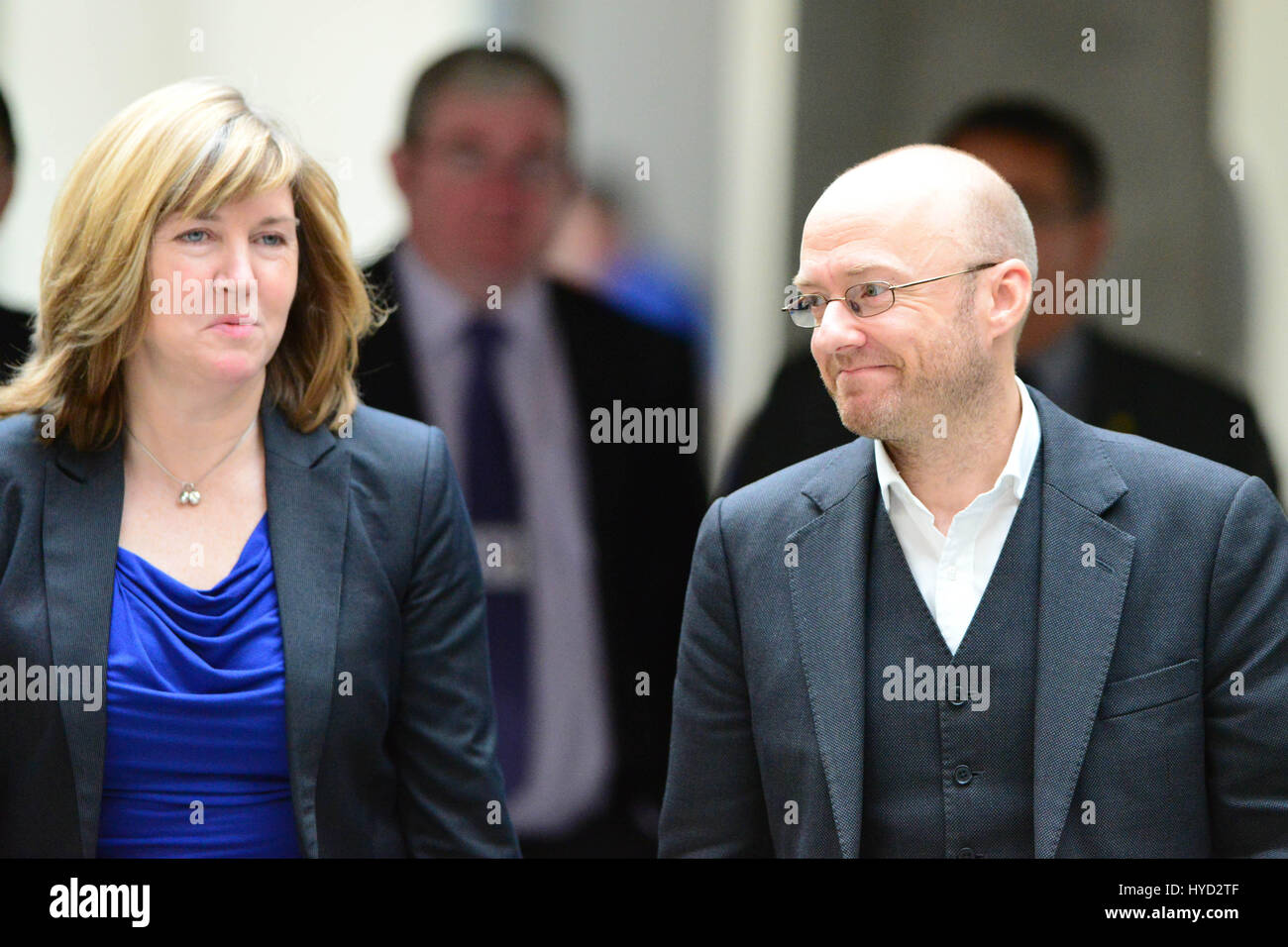 Scottish Green Party co-convener Patrick Harvie and fellow Green MSP Alison Johnstone make their way to the chamber of the Scottish Parliament to listen to First Minister Alex Salmond's statement to MSPs following the Scottish independence referendum and his decision to stand down Stock Photo