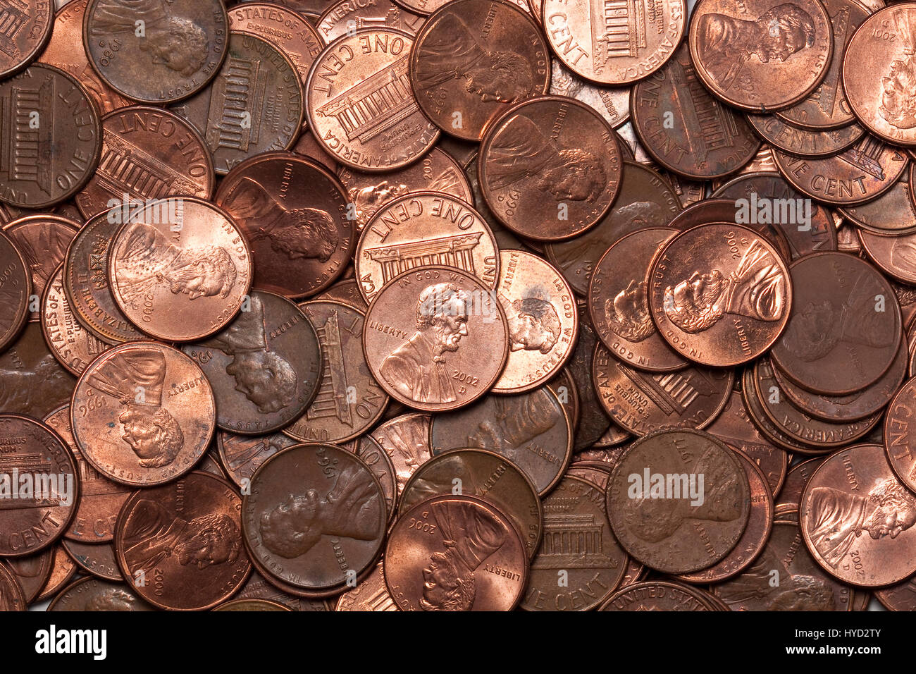 Pennies - A large number of coins Stock Photo