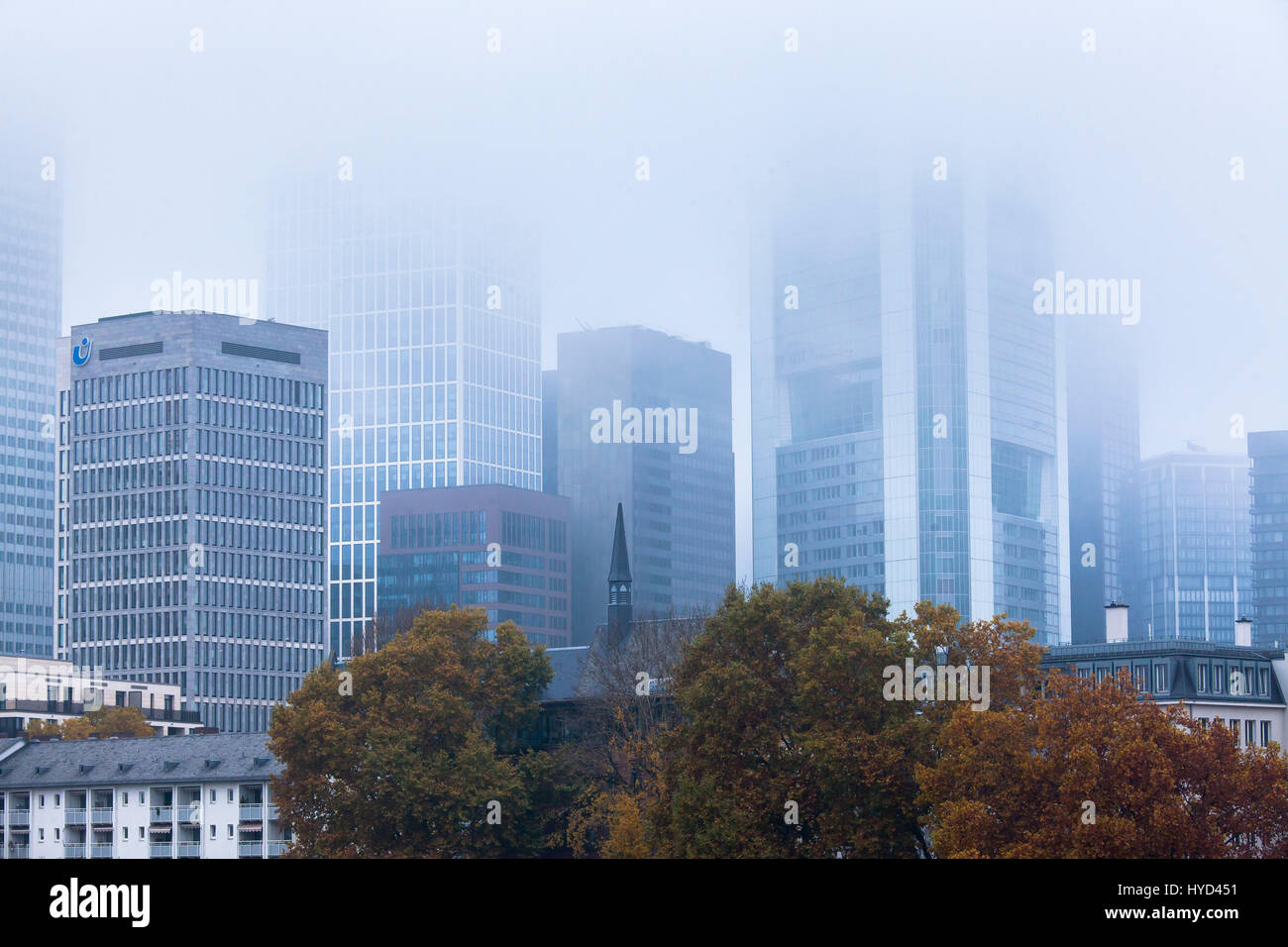 , Germany, Hesse, Frankfurt, the skyscrapers of the financial district in fog. Stock Photo
