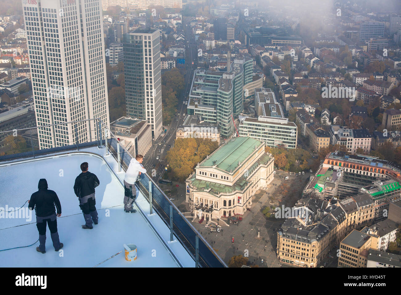 Hesse, Frankfurt, workers on the Maintower, view to the Opernturm, the German headquarters offices of Union Bank of Switzerland AG, UBS bank Stock Photo