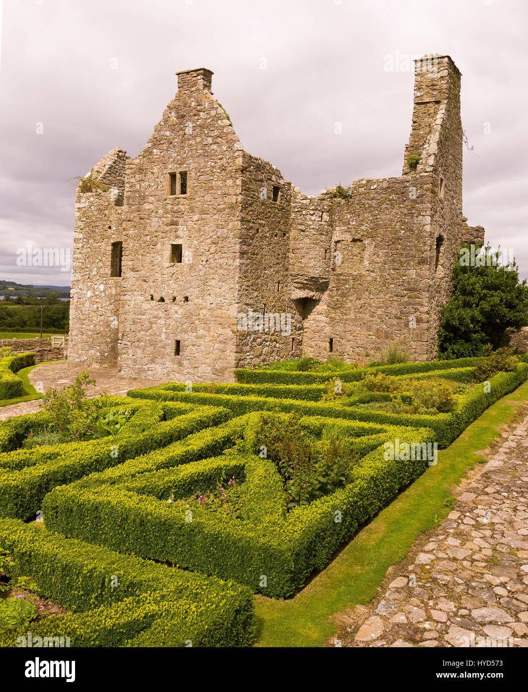 TULLY CASTLE, NORTHERN IRELAND - Gardens at ruins of Tully Castle, near Enniskillen, on Lower Lough Erne. Tully Castle, built early 1600s, in County Fermanagh, near the village of Blaney. Stock Photo