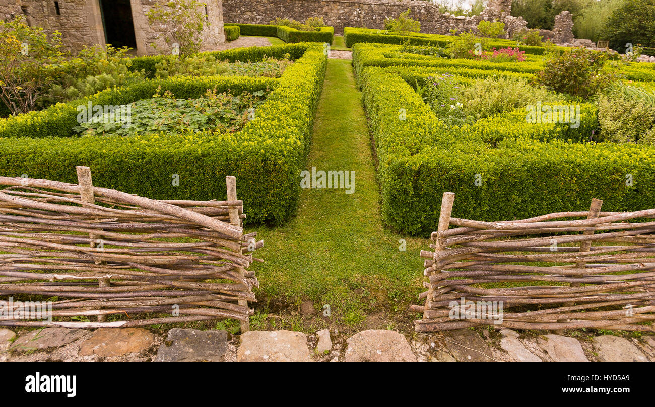 TULLY CASTLE, NORTHERN IRELAND - Gardens at ruins of Tully Castle, near Enniskillen, on Lower Lough Erne. Tully Castle, built early 1600s, in County Fermanagh, near the village of Blaney. Stock Photo