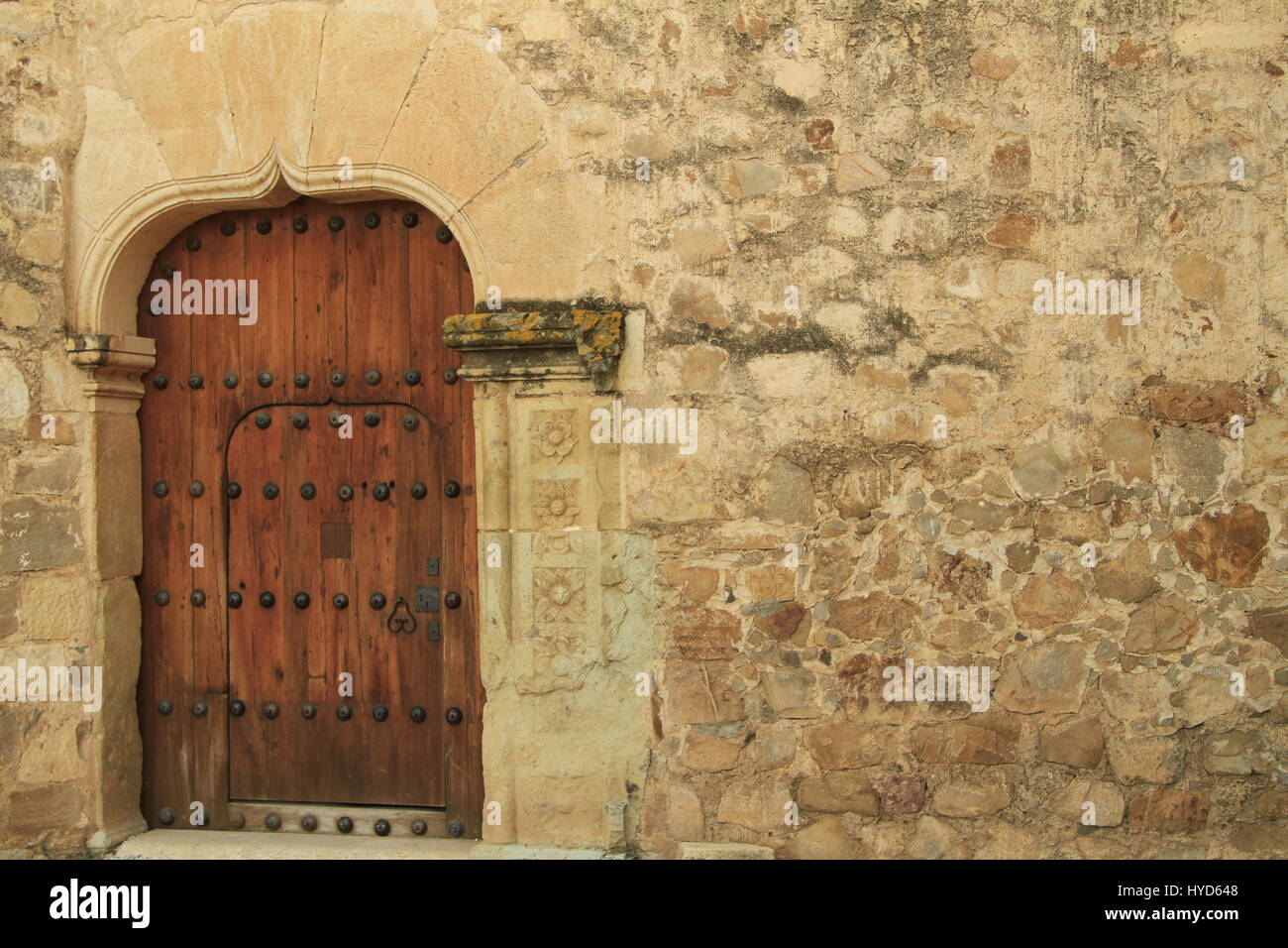 Elaborate medieval wood interior door inside the Ex-monastery of Santiago Apóstol, Oaxaca, Mexico. Stock Photo