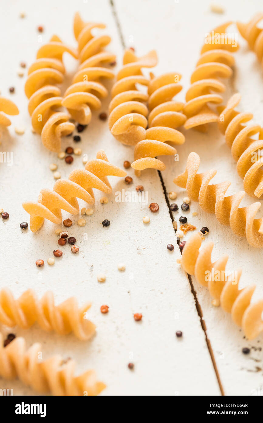 Pasta and quinoa on white background Stock Photo