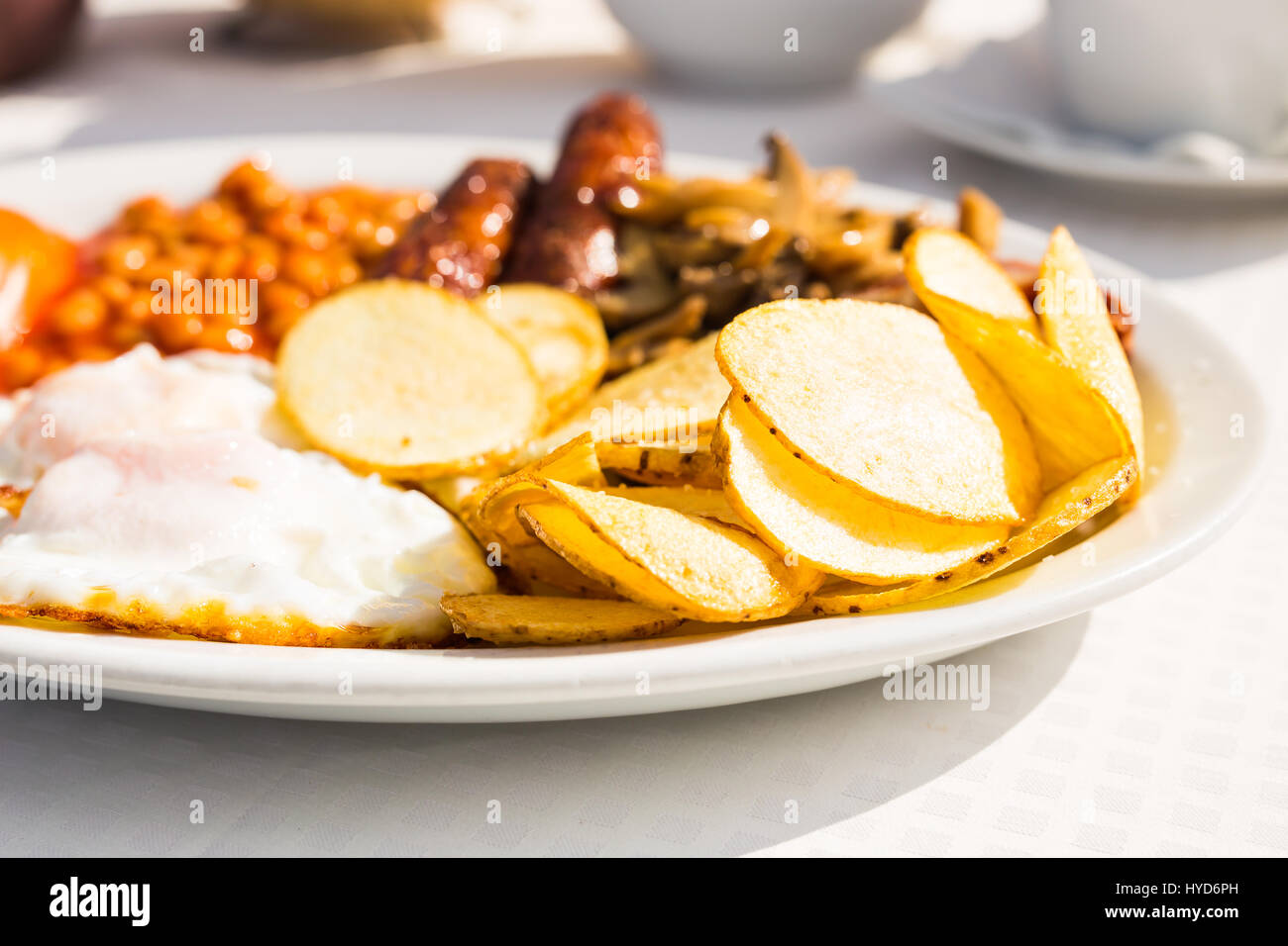 Full English Breakfast including sausages, tomatoes and mushrooms, egg