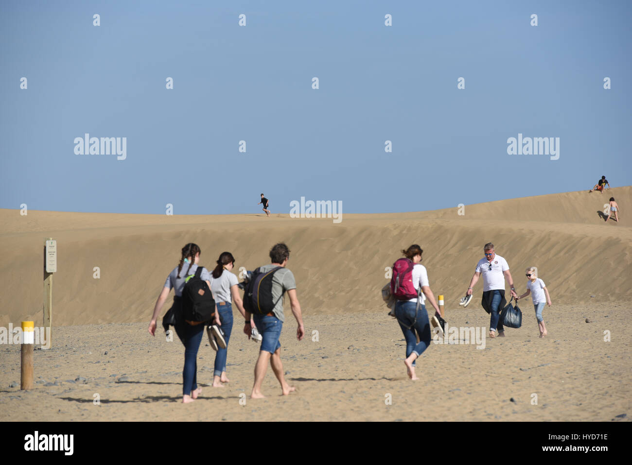 People walking at sand dunes Stock Photo - Alamy