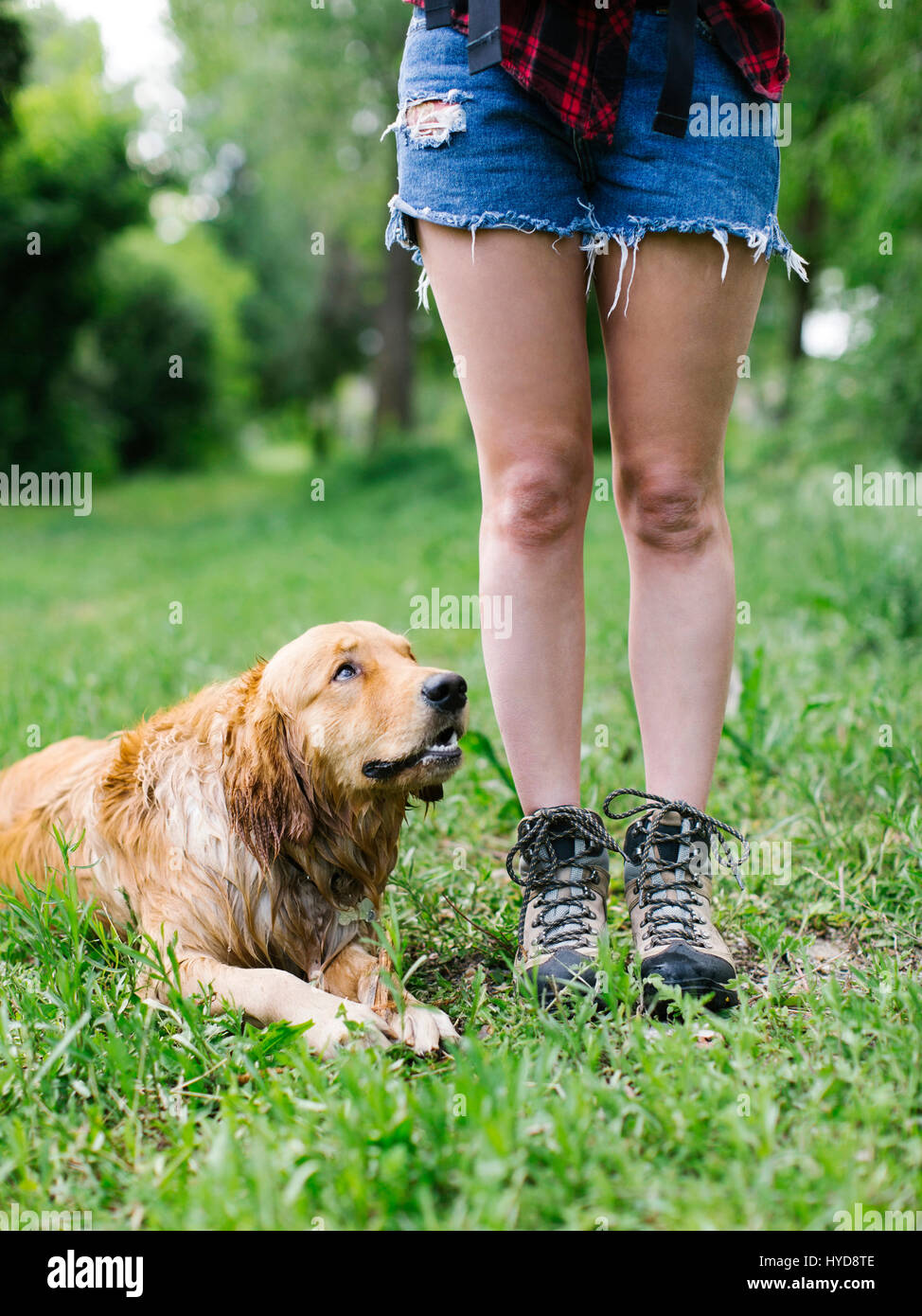 Standing woman in shorts hi-res stock photography and images - Alamy