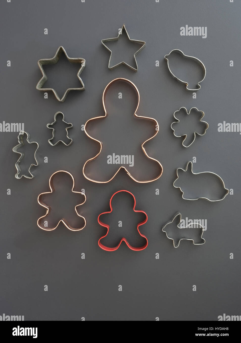 Studio shot of cookie cutters on grey background Stock Photo