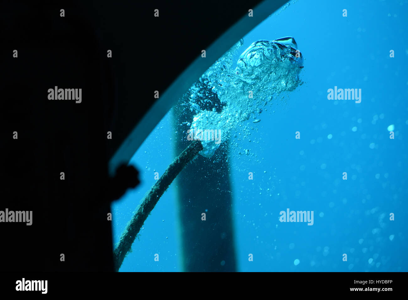 water bubbles through the pipe underwater Stock Photo Alamy