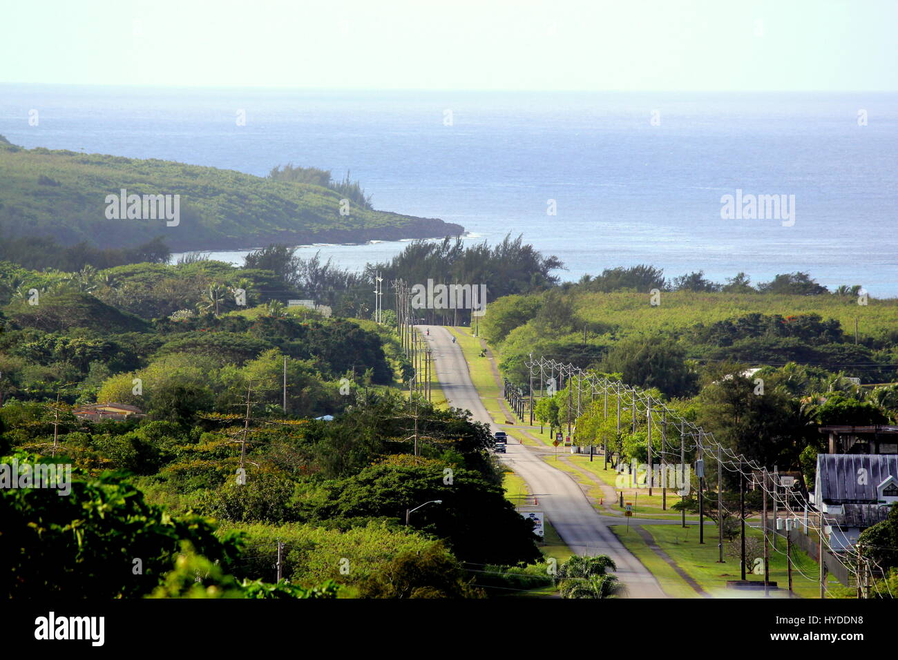 Tinian main road, Northern Mariana Islands The road going down to San Jose village in Tinian Stock Photo