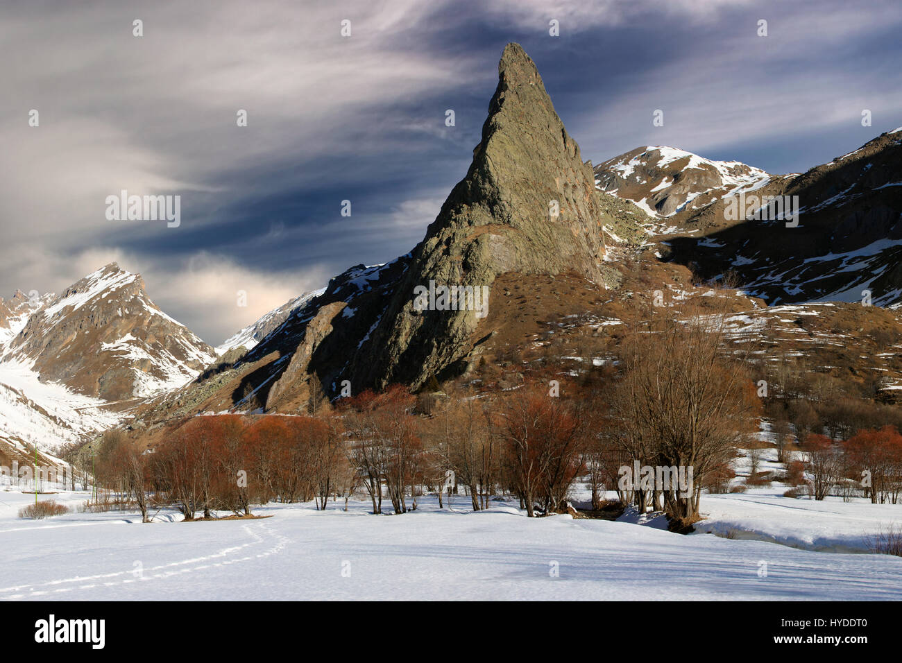 The amazing rock formation known as Rocca Provenzale in Valle Varaita, one of the many valleys of the italian western Alps in Piedmont, Italy Taken on Stock Photo