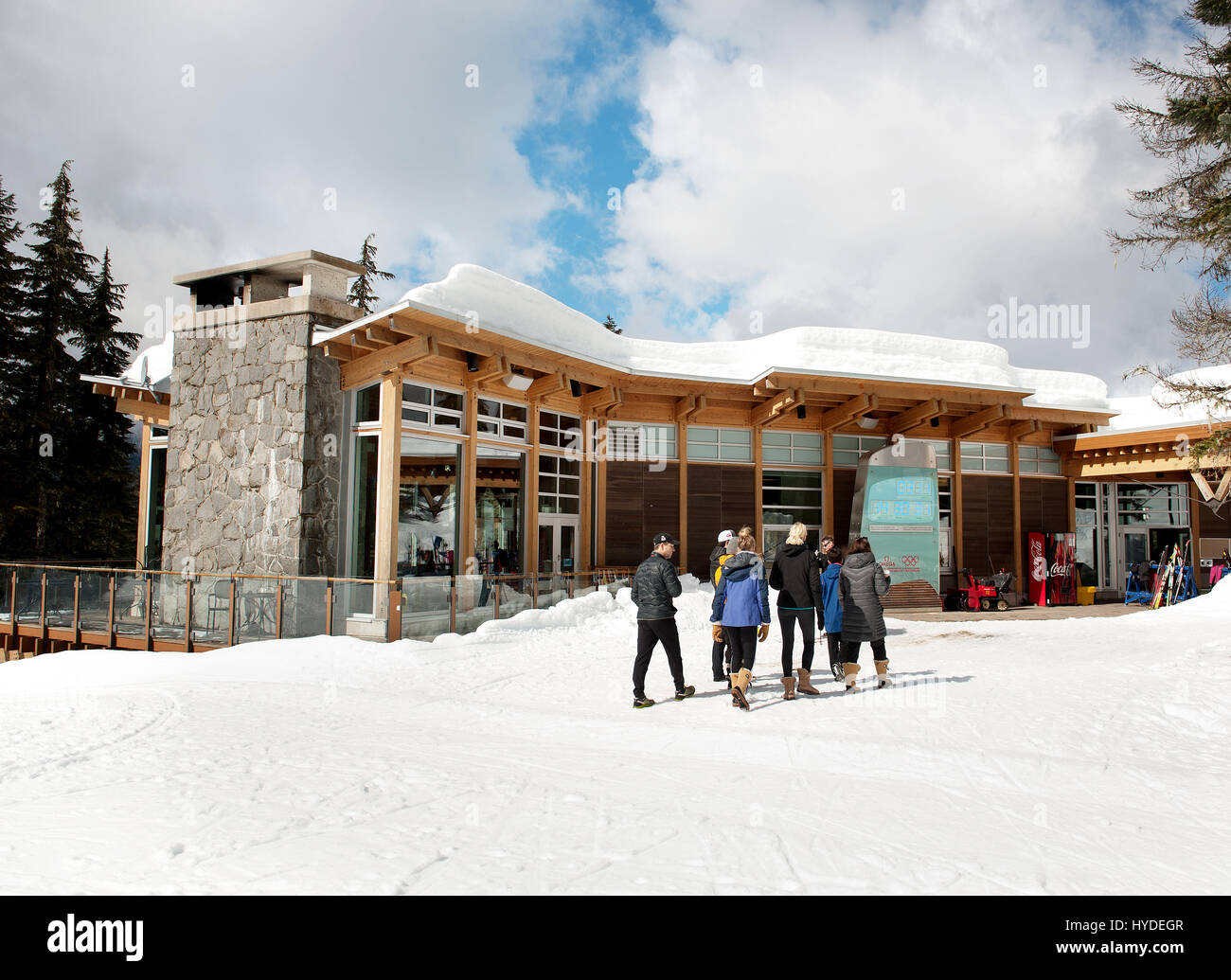 People in front of the day lodge at the Whistler Olympic Park. Stock Photo