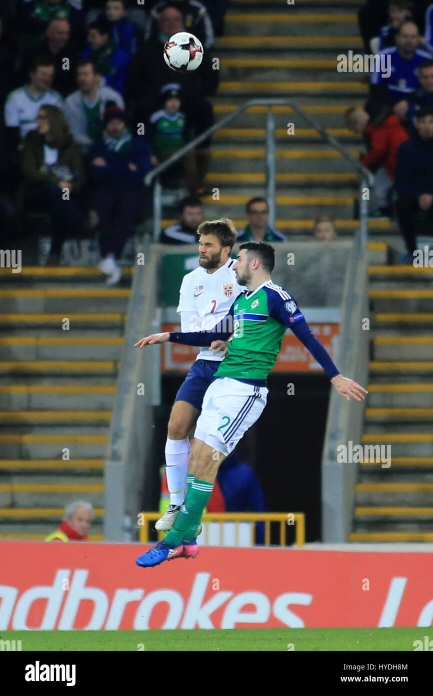 Norway's footballer Jorgen Skjelvik and Northern Ireland's Conor McLaughlin heads the ball during a match in Belfast. Stock Photo