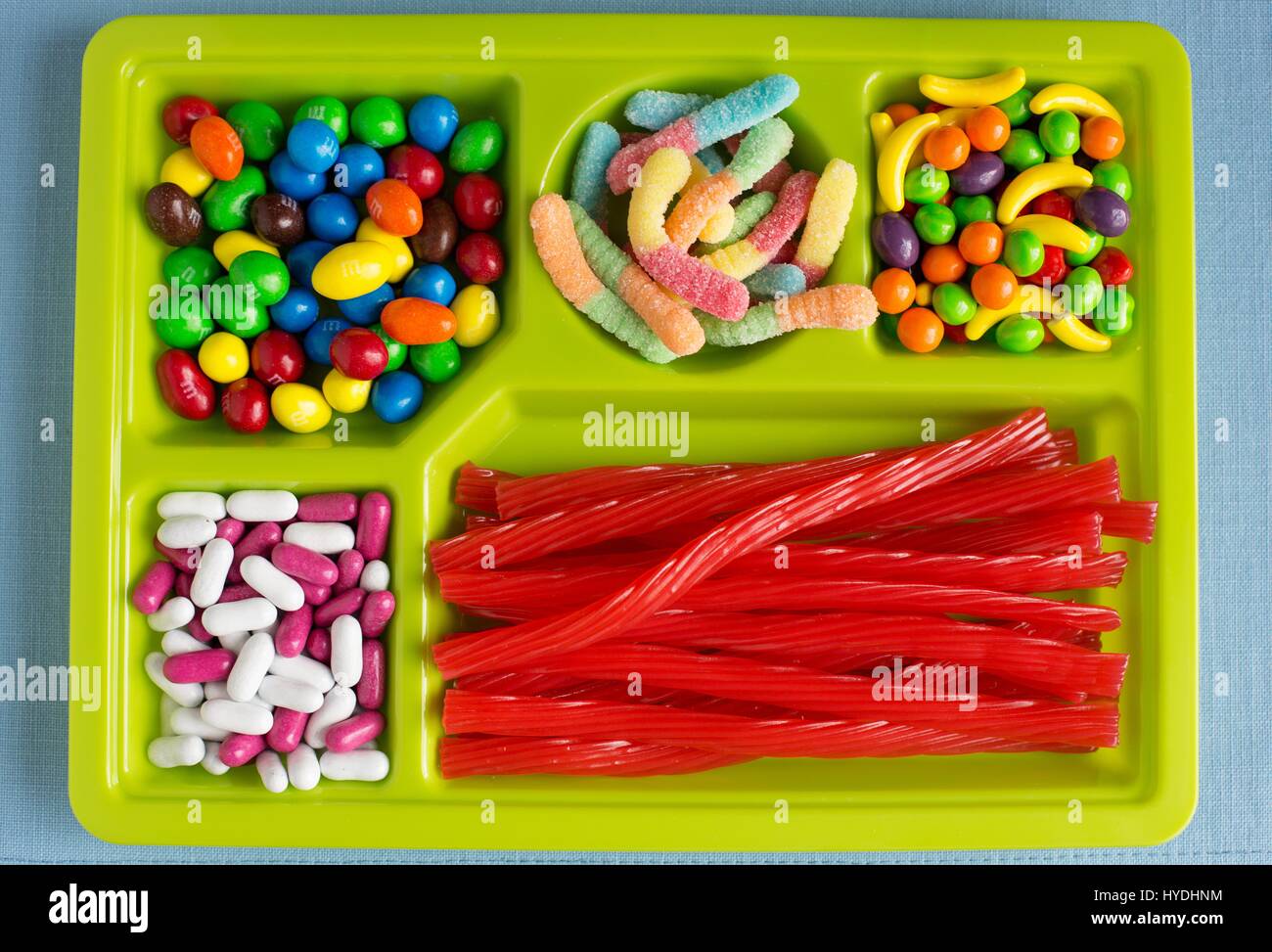A variety of candy on a cafeteria tray. Stock Photo