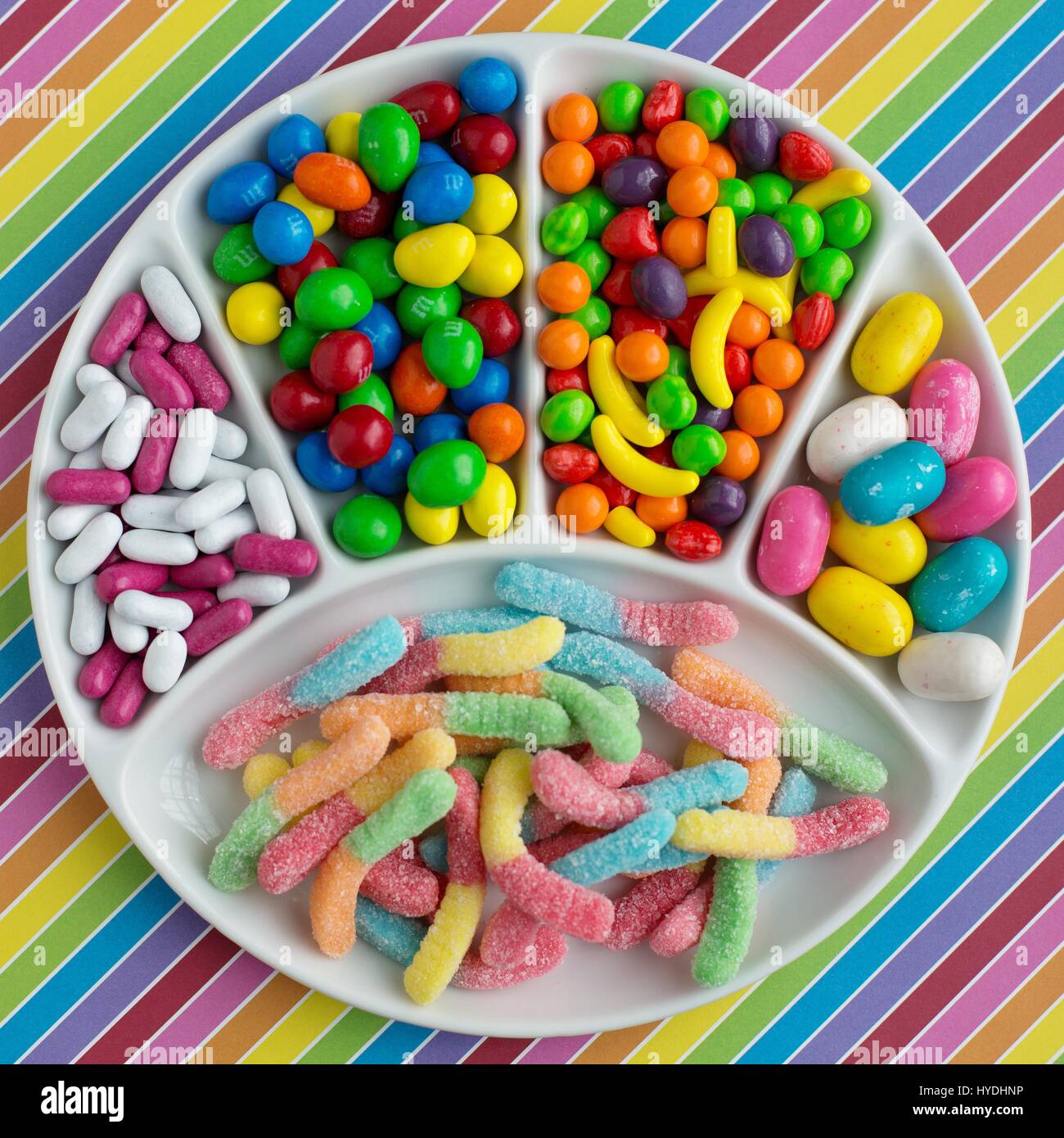 A variety of candies on a plate. Stock Photo