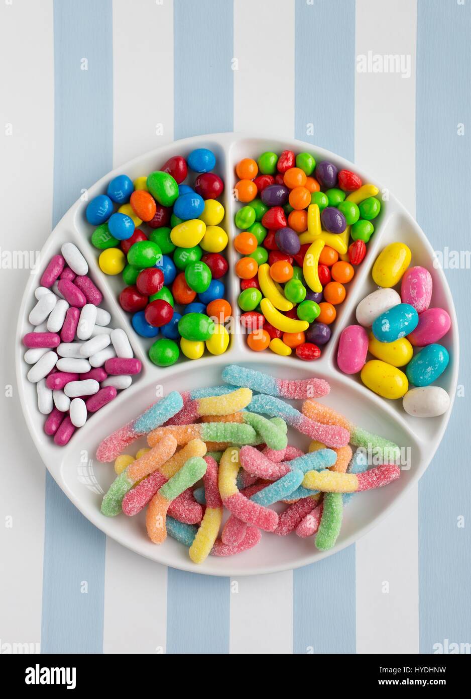 Different varieties of candy on a plate. Stock Photo