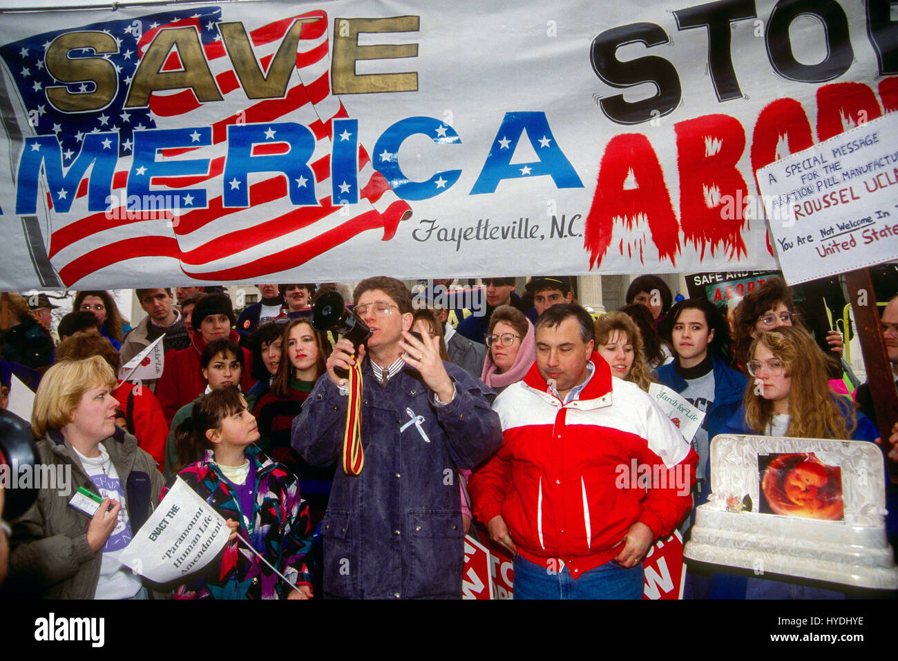 Randall Terry (in blue coat) of Operation Rescue speaks to the marchers