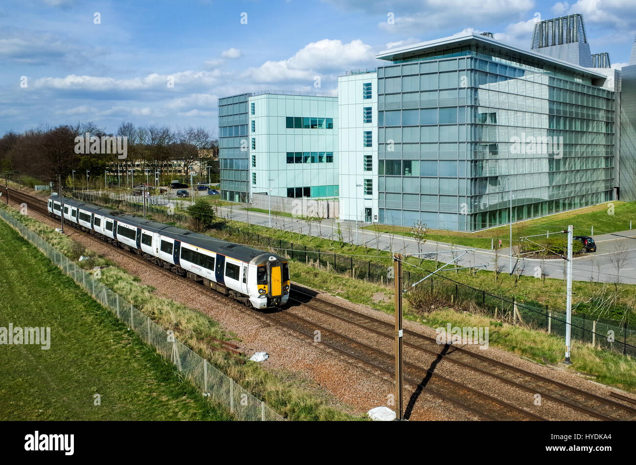 Biomedical MRC Molecular Biology Lab / Train - A London to Cambridge Train  passes the MRC Laboratory of Molecular Biology, Cambridge UK. Stock Photo