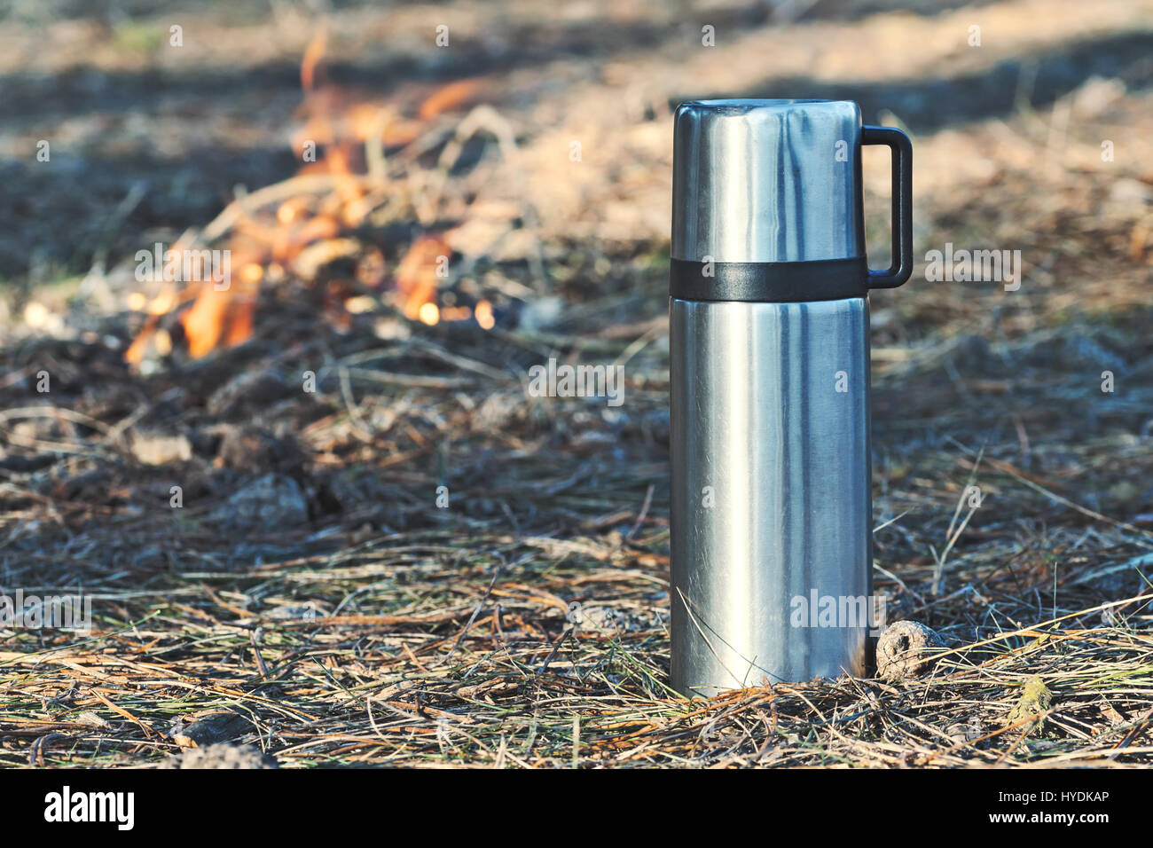 https://c8.alamy.com/comp/HYDKAP/closeup-photo-of-thermos-bottle-and-cup-or-mug-with-coffee-tea-or-HYDKAP.jpg