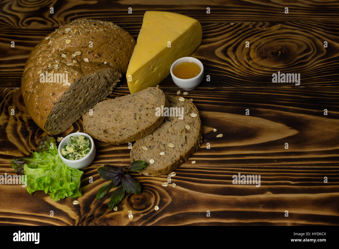 The bread and cut the slices with a large triangular piece of cheese ...