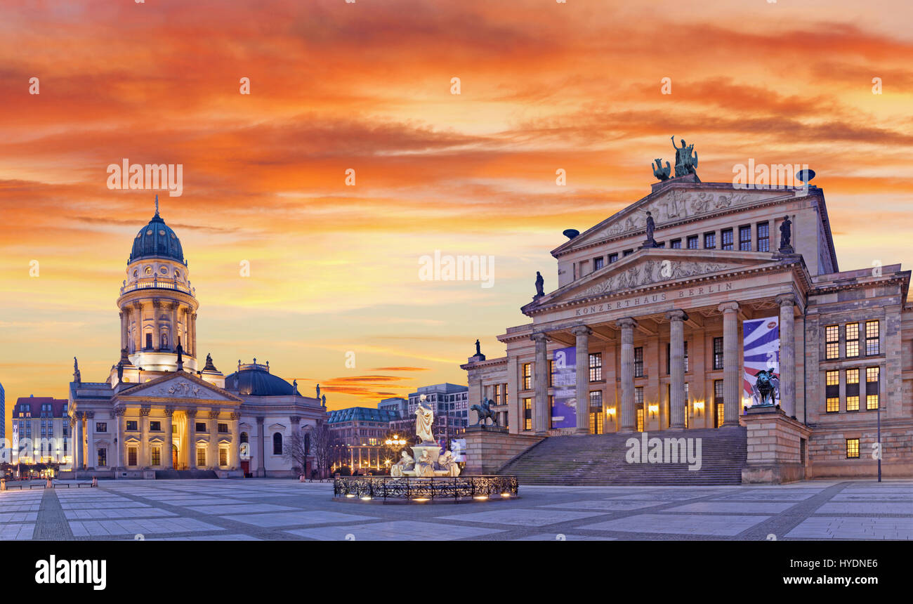 BERLIN, GERMANY, FEBRUARY - 13, 2017: The Deutscher Dom church and The Konzerthaus building in Gendarmenmarkt square at dusk. Stock Photo