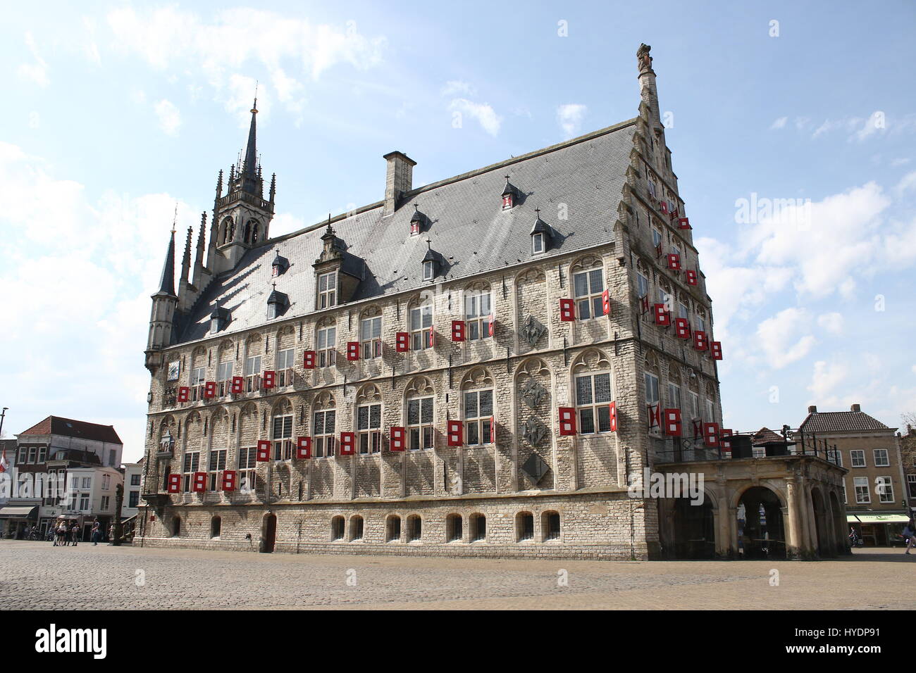 Market square with iconic 15th century gothic city hall (Stadhuis van Gouda), Gouda, Netherlands Stock Photo