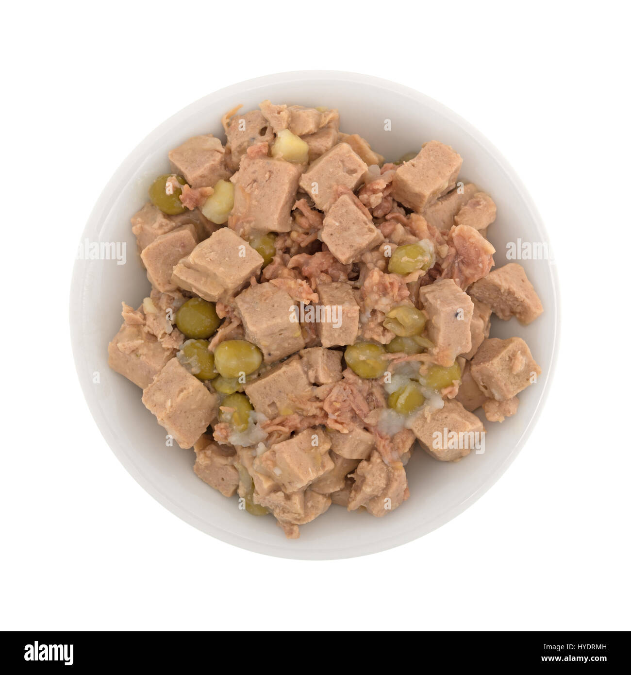 Top view of a bowl of lamb and duck with vegetables gourmet dog food isolated on a white background. Stock Photo