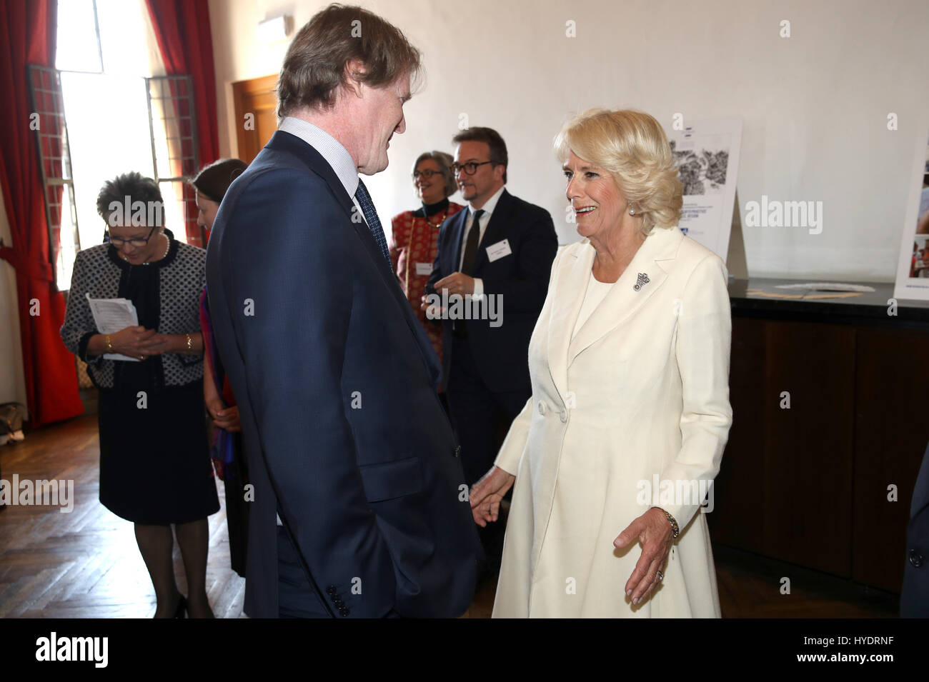 The Duchess of Cornwall talks to Mark Getty at The British School in Rome, Italy, on the seventh day of the Prince of Wales's nine-day European tour. Stock Photo