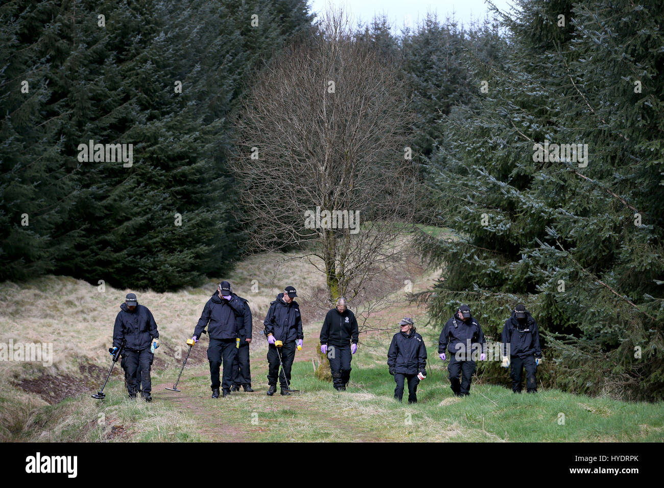 Police search woodland near Roberton in South Lanarkshire after Police Scotland appealed for new information in relation to the disappearance of Emma Caldwell who was found dead in woods near Biggar, South Lanarkshire, in May 2005. Stock Photo