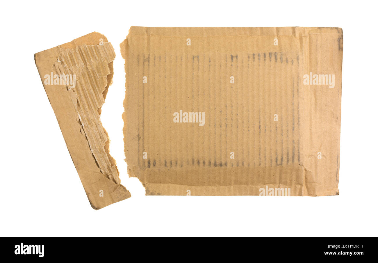 A cardboard packaging mailer that has been torn open isolated on a white background. Stock Photo