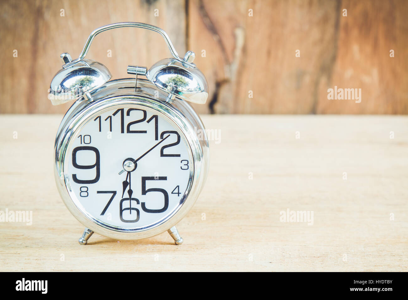 Clock show 6 am or pm and 30 minute on wood background with copy space ...