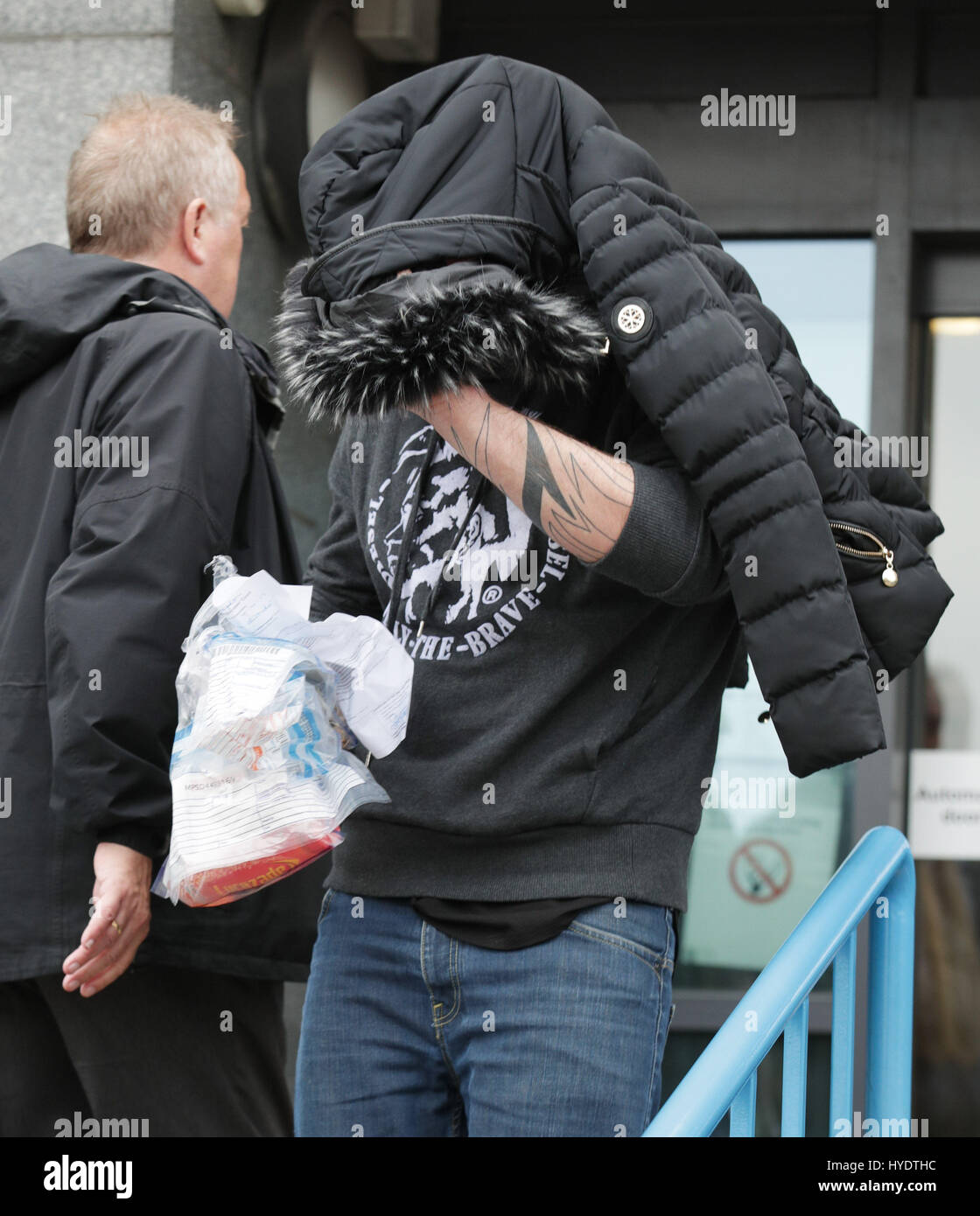 Kyran Evans, 23, leaves Croydon Magistrates' Court, where he is amongst a group charged with violent disorder following a suspected hate crime which left a teenage asylum seeker fighting for his life. Stock Photo