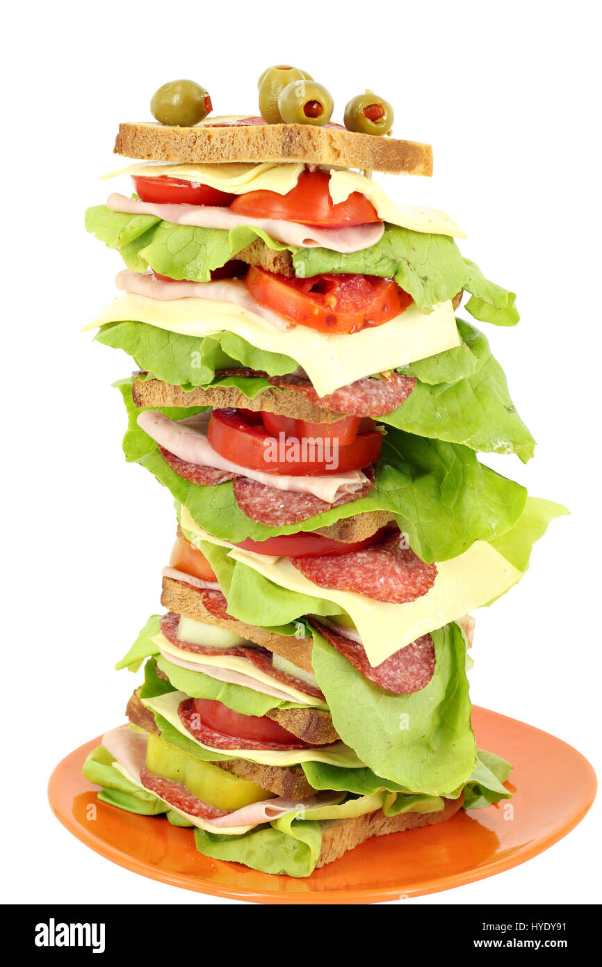 tall sandwich with ham salad and cheese on white background Stock Photo