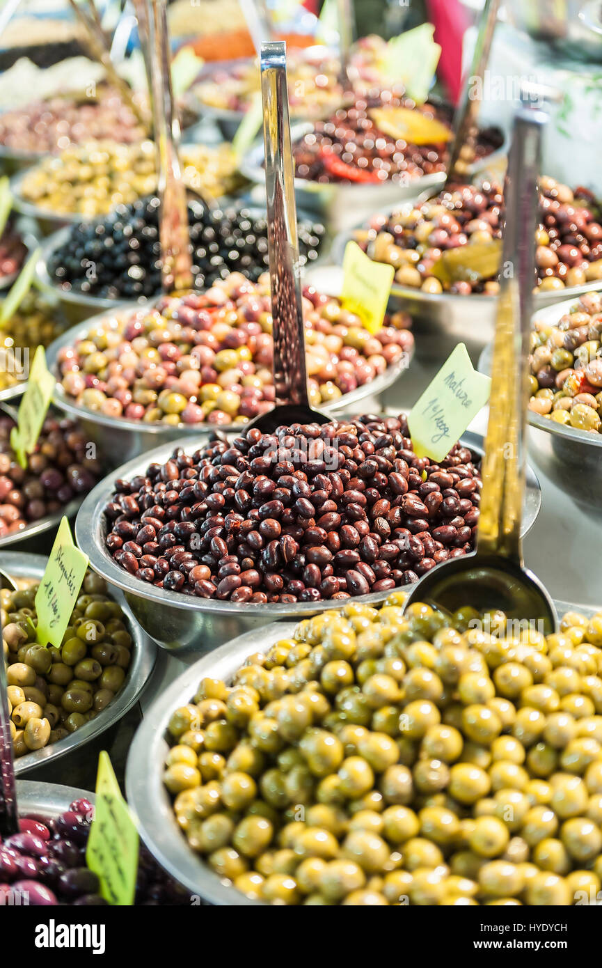 Different marinated olives on street market Stock Photo Alamy