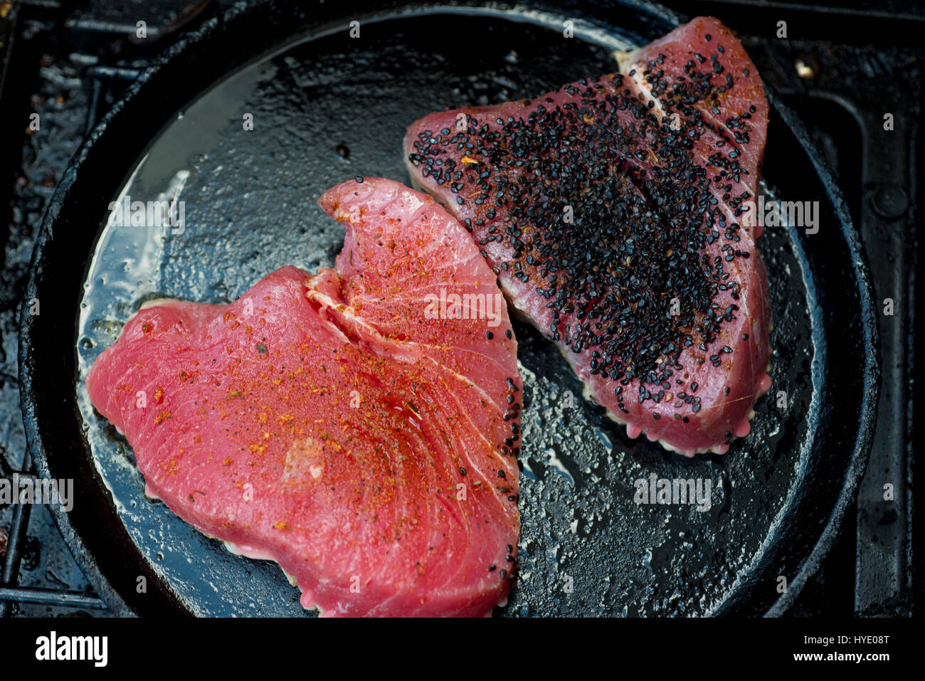 tuna fish on iron skille on grill t Stock Photo Alamy