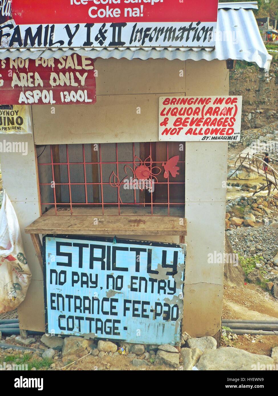 Many Signs And Rules Posted On The Front Desk Of A Hot Spring
