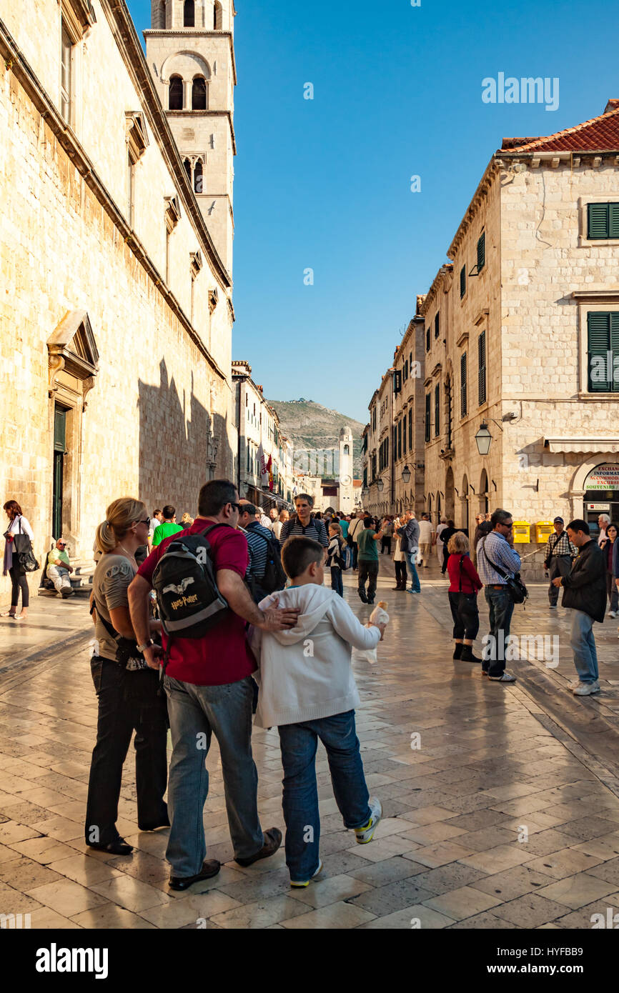 Tourists wander the old city in Dubrovnik Stock Photo