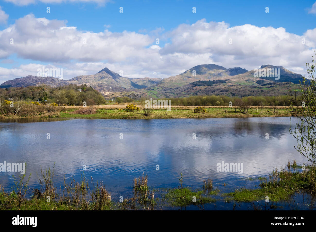 Cnicht, Moelwyn Mawr and Moelwyn Bach mountains in Snowdonia National Park across Afon Glaslyn River. Pont Croesor Porthmadog Gwynedd North Wales UK Stock Photo