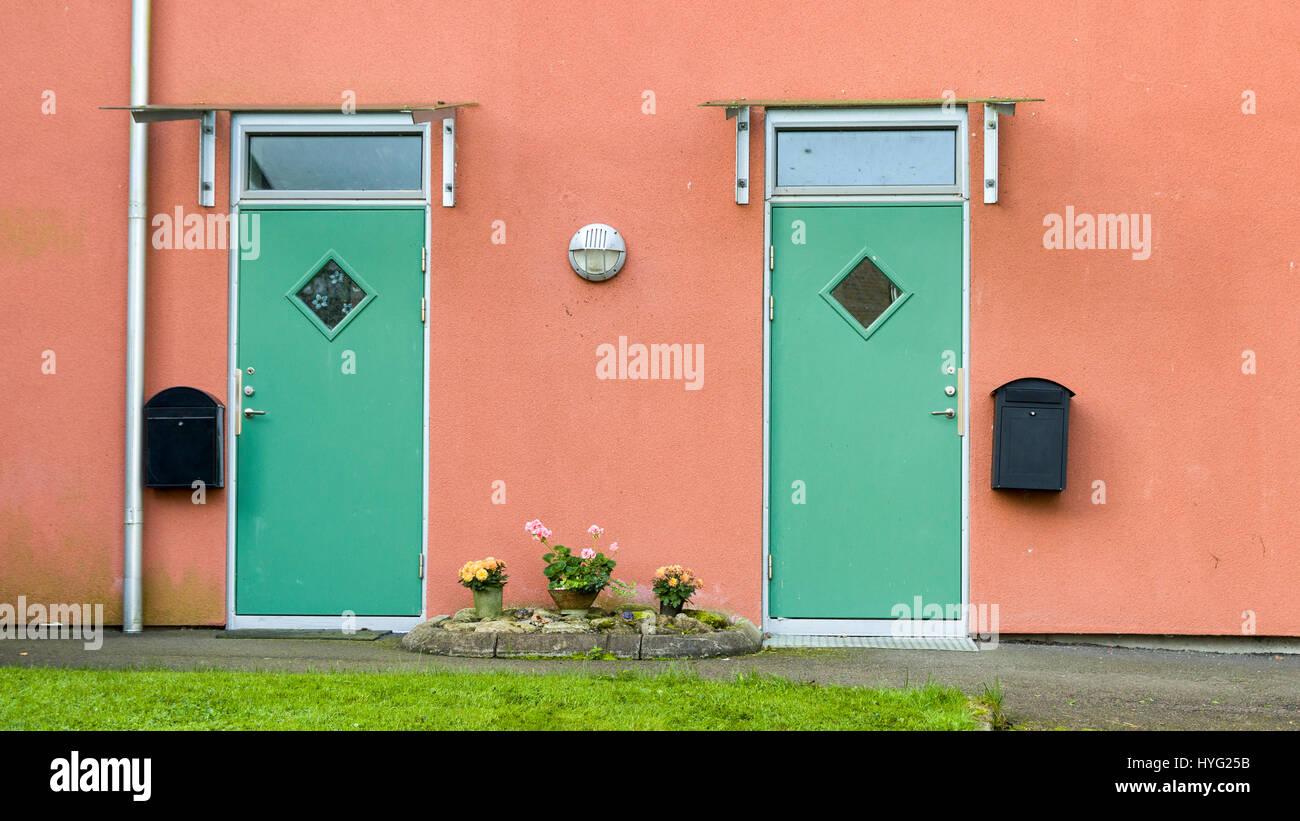 Exterior view of two door entrances to apartments Model Release No