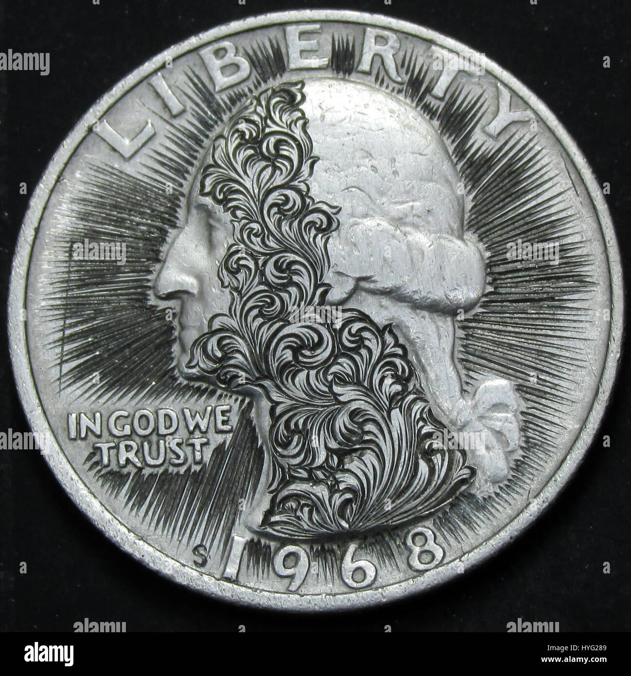STUNNING pictures and video have revealed miniature works of art that have been hand engraved into coins. The incredible footage shows the painstaking process the hand engraver goes through to create a cool design on an 1896 Queen Victoria penny. Other amazing engravings include a portrait of the musician Prince on a US quarter, Abraham Lincoln sitting on a toilet on a US penny and Roman centurion carved onto a 1,000-year-old Constantine Roman coin. The labour of love engravings were carried out by hand engraver Shaun Hughes (53) from Essex who began recording his work to inspire others who wa Stock Photo