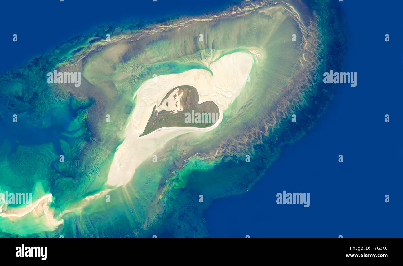 Aerial view of an island in the shape of a heart - Elements of this image are furnished by NASA Stock Photo