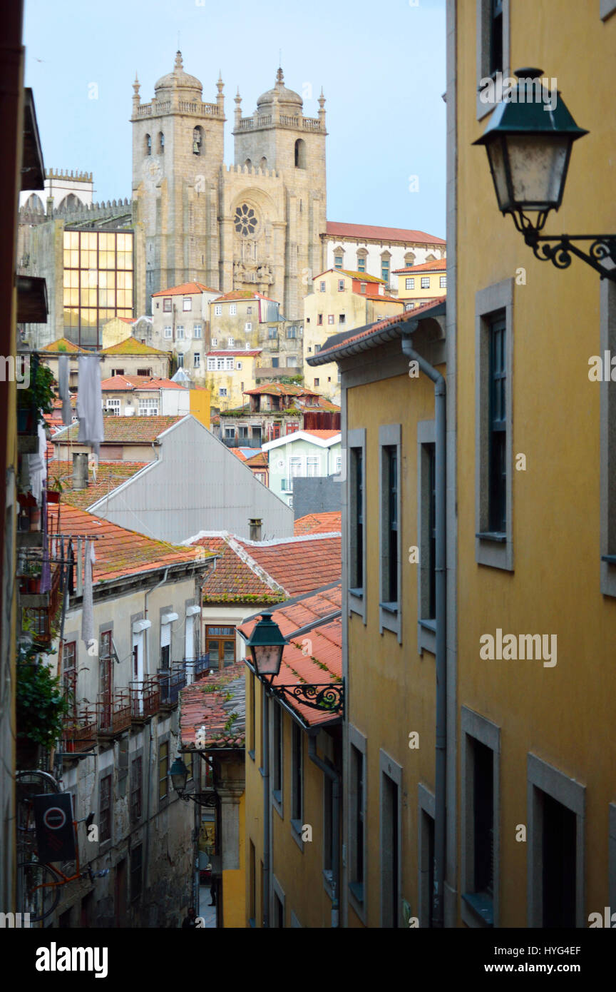 Narrow, cobbled street scene in the Portuguese city of Porto in 2017, Portugal with view to the Se Cathedral Ribeira Stock Photo