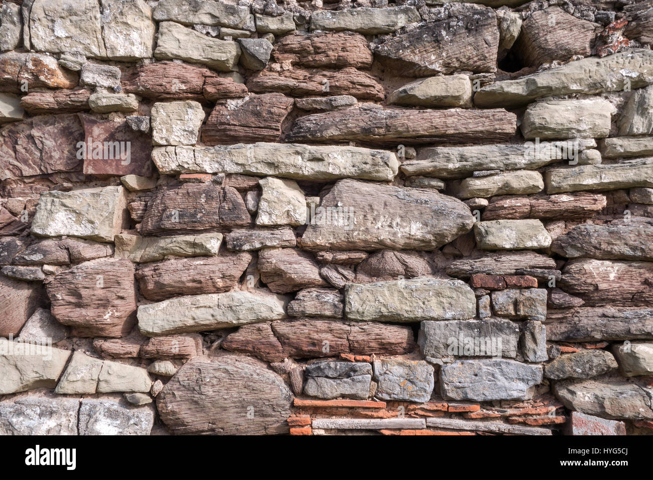 Uneven stone wall Stock Photo Alamy