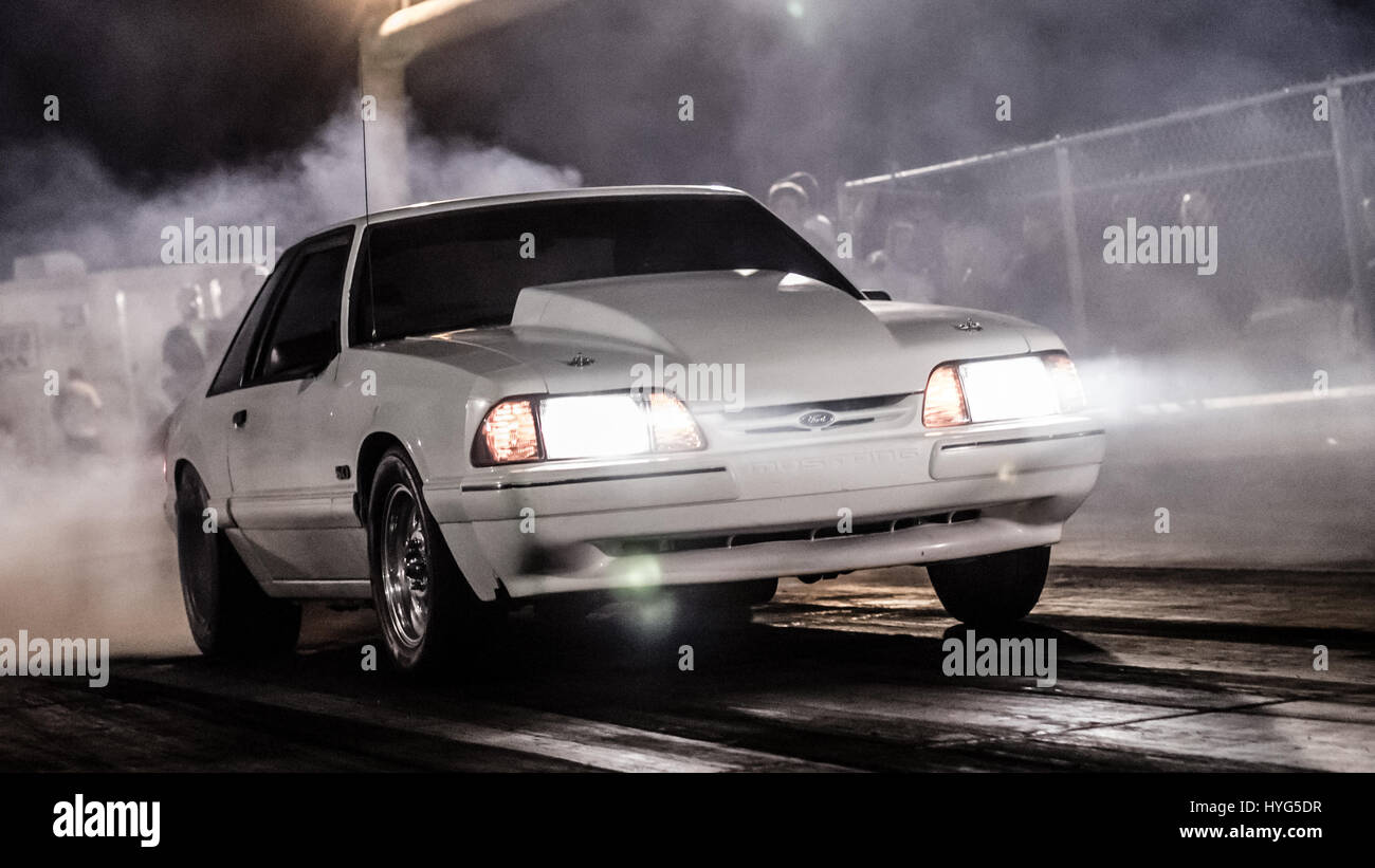 Fox body mustang does a smoky burnout Stock Photo