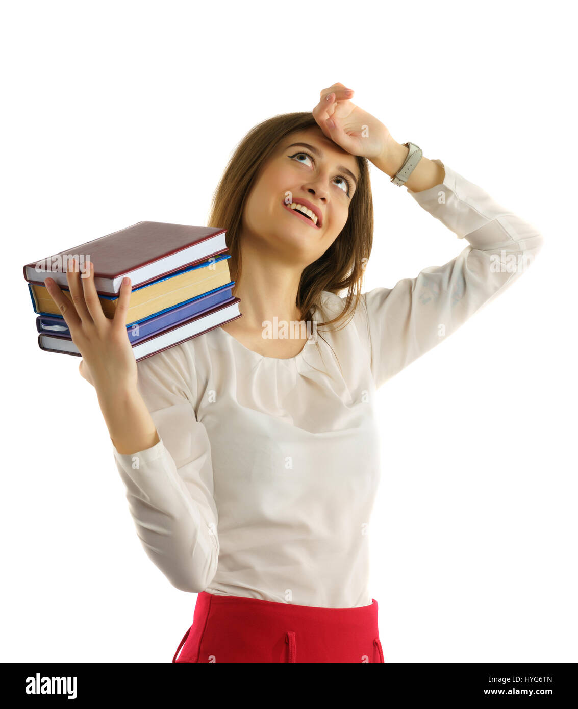 Pretty young student girl holds stack of books in hands Stock Photo - Alamy