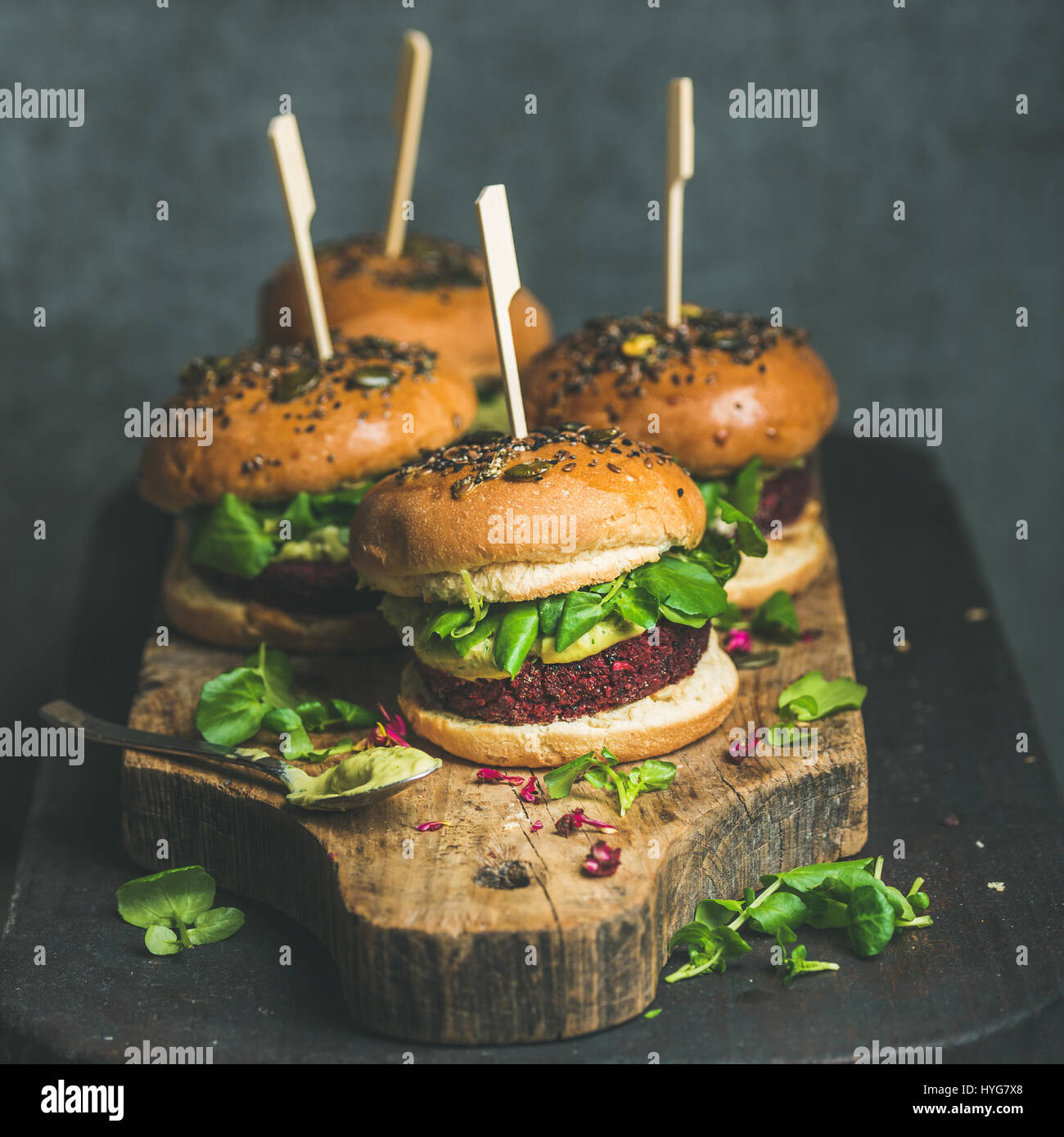 Healthy homemade vegan burger with beetrootquinoa patty and arugula