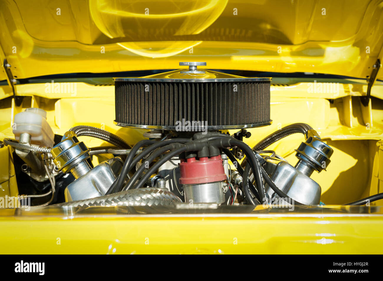 air filter and spark systems in the engine bay of a high performance