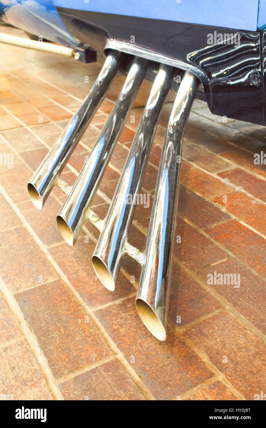 chrome exhaust pipes on a performance race car Stock Photo Alamy