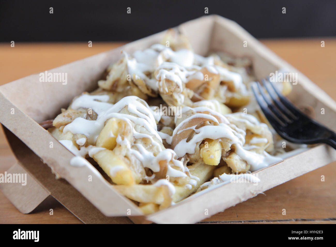 Poutine fries with meat and cheese Stock Photo Alamy